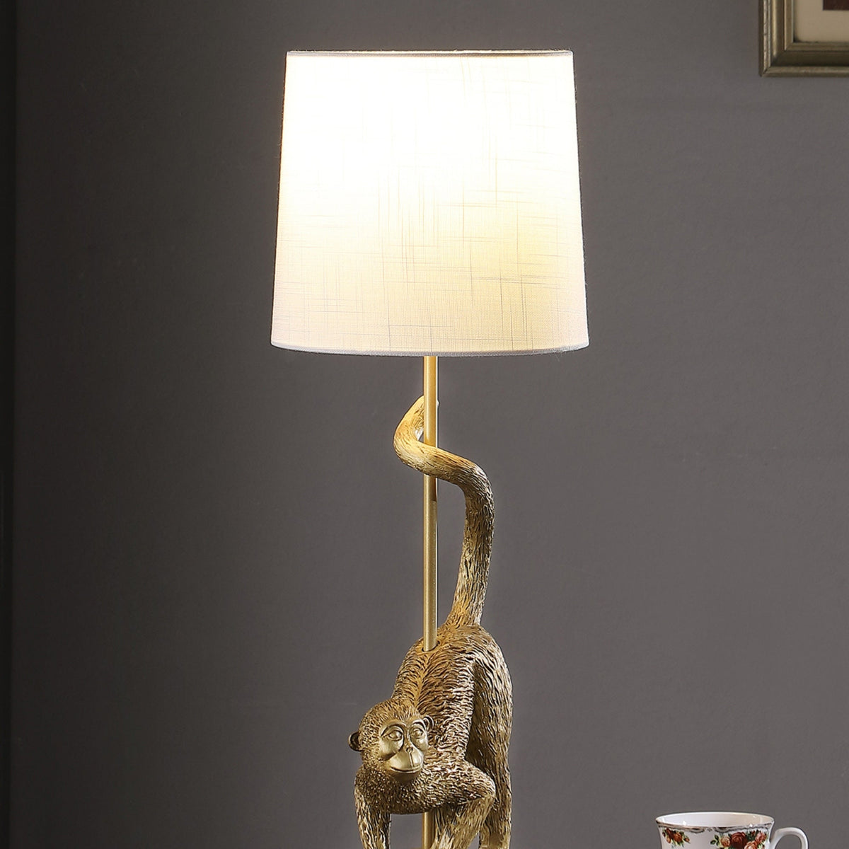 24-Inch Old World Gold Capuchin Monkey Table Lamp with Cotton/Linen Shade - Golden White